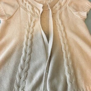 Women’s cable knit sweater cover up.